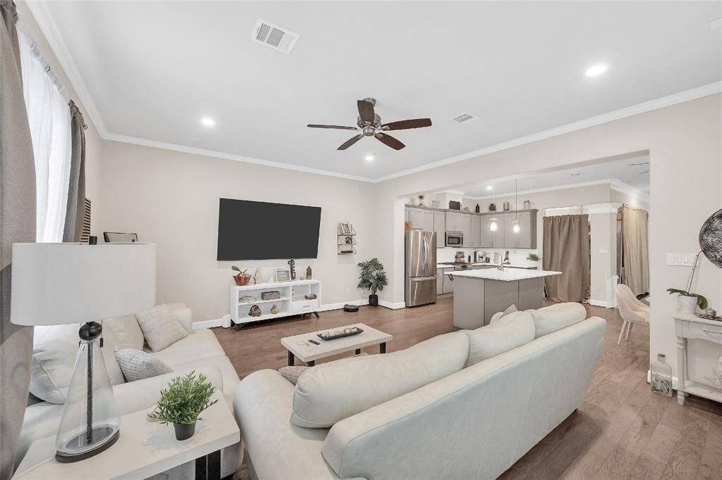 The den is the perfect place for entertaining or casual nights in.