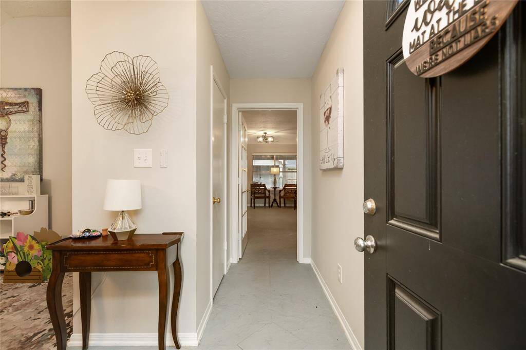 Upon entry, you're greeted by a neutral palette and a layout full of potential. This space sets the tone for a home that’s ready for your personal touch.