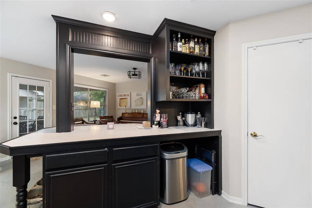 Just off the breakfast bar is a nook perfect for a future dry bar or coffee station—an ideal setup for entertaining or casual everyday use.
