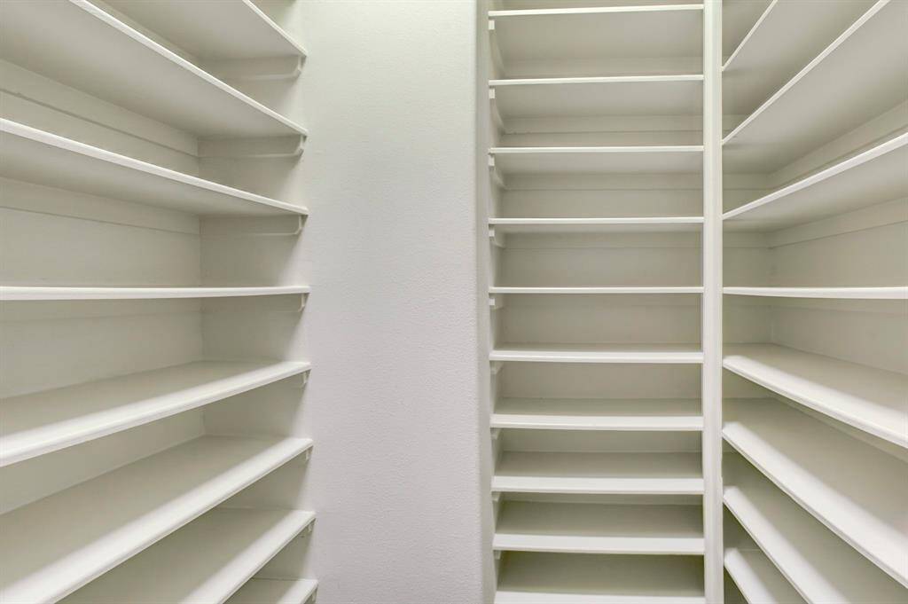 The 2nd Primary Closet has very impressive & useful built-in shelving.