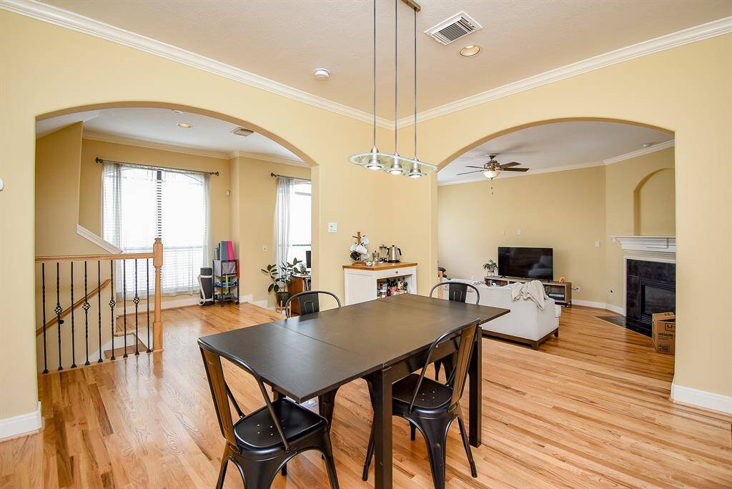 Arched entryways into dining room makes this the perfect space to entertain.
