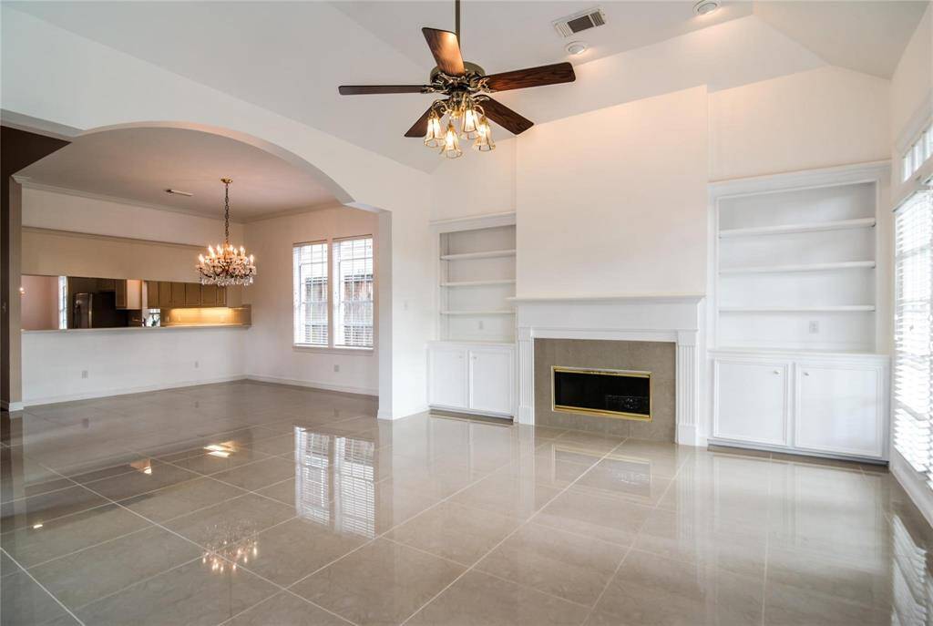 Formal Living w/Fireplace & French Doors to Patio