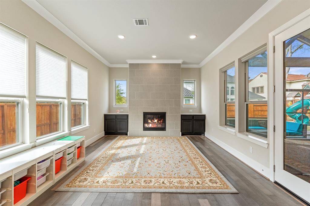 Inviting hearth room offers a perfect space for relaxation, featuring a charming fireplace that creates a warm and welcoming atmosphere. With built-in storage and ample quartz counter space, this room is as functional as it is cozy. Imagine enjoying your morning coffee in the potential breakfast nook area, making it a perfect spot to start your day.