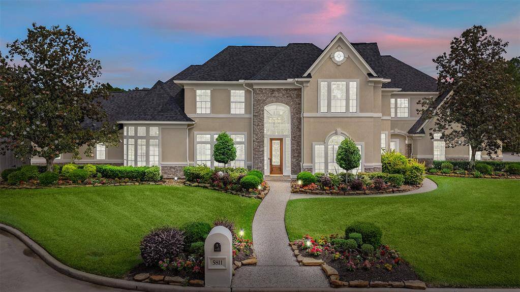 Arrive home to timeless Mediterranean elegance on a quiet cul-de-sac. The lush landscaping, sweeping driveway, and grand stone-and-stucco façade set the tone for refined living. As you step onto the covered porch, you're welcomed into a space that exudes both presence and warmth.