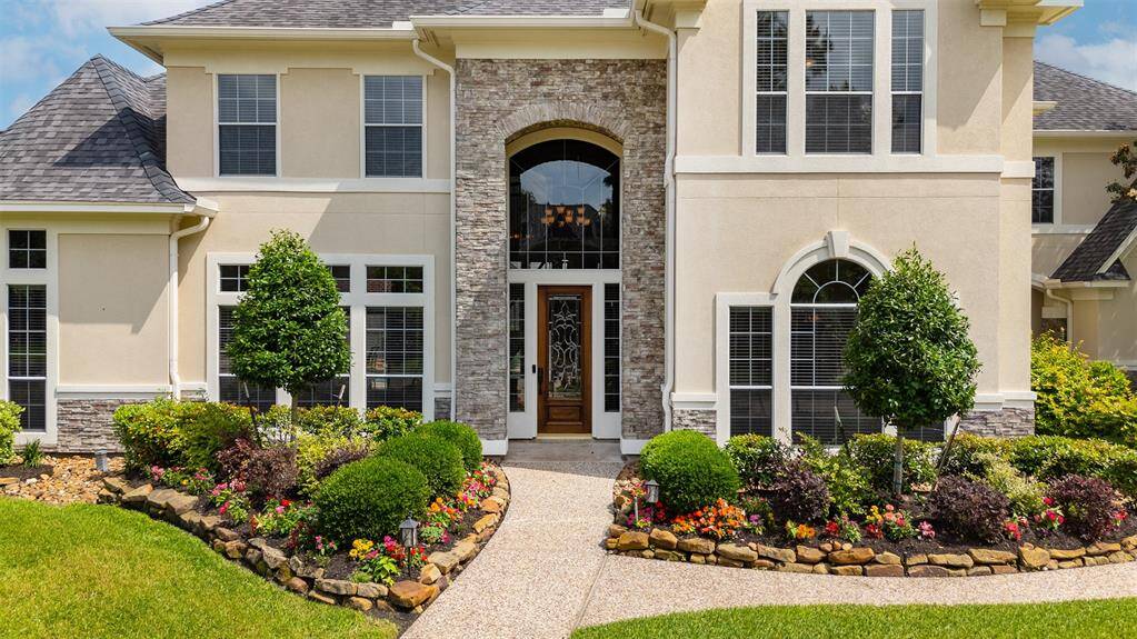 As you approach the front door, the scale and detail of the entrance set the tone. Step inside and take a closer look — where classic design and timeless elegance welcome you home.