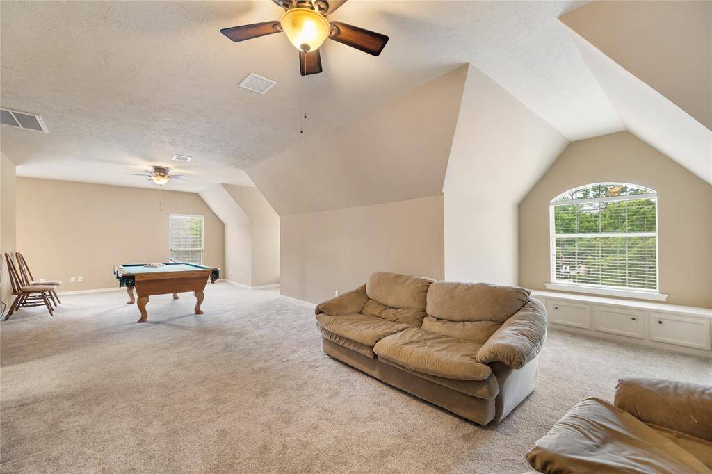 Create unforgettable moments in the expansive game room — ideal for billiards, gaming, or relaxing with friends.