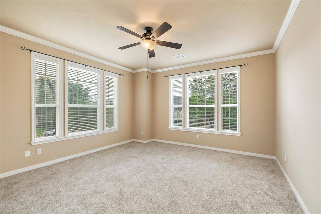 Each secondary bedroom offers a comfortable and quiet retreat, freshly painted in 2024 to create a clean, modern feel. Soft carpeting was replaced in 2023, adding warmth and comfort underfoot. With spacious layouts and ample closet storage, these rooms are ideal for family, guests, or a flexible home office.