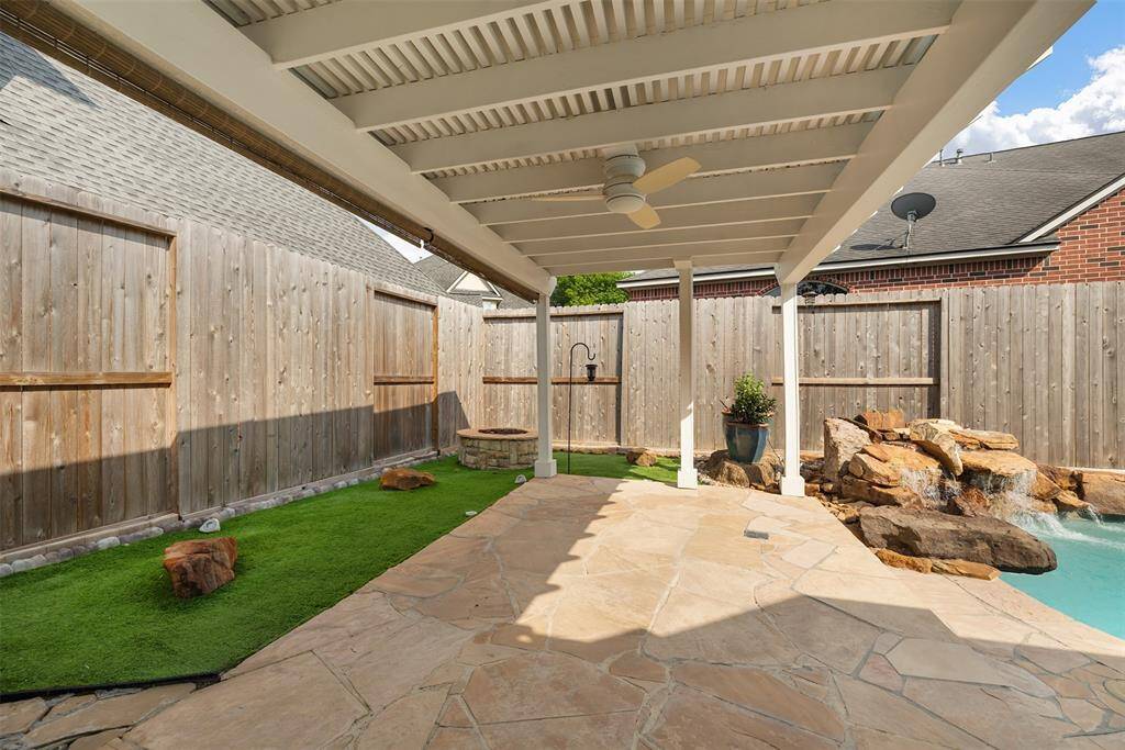 The covered patio is the ultimate extension of the home — perfect for sipping morning coffee, hosting weekend BBQs, or escaping the summer sun. Featuring a 3-inch insulated pergola roof added in 2015, this space offers both comfort and durability, keeping you cool in the heat and protected from the elements. With enough space for both lounging and dining, it’s where memories are made all year long, rain or shine.