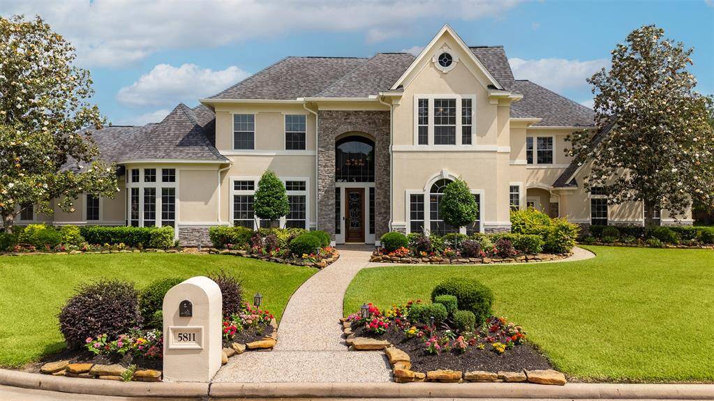 The home's stunning facade combines timeless architecture with thoughtful modern updates, including a beautiful stone enhancement completed in 2021. Behind the beauty, key systems have been meticulously maintained: a new A/C installed in 2019, the roof professionally conditioned in 2023, and a full-home generator added in 2024 for peace of mind. The fence was also replaced in 2021, ensuring the exterior is as functional as it is beautiful.