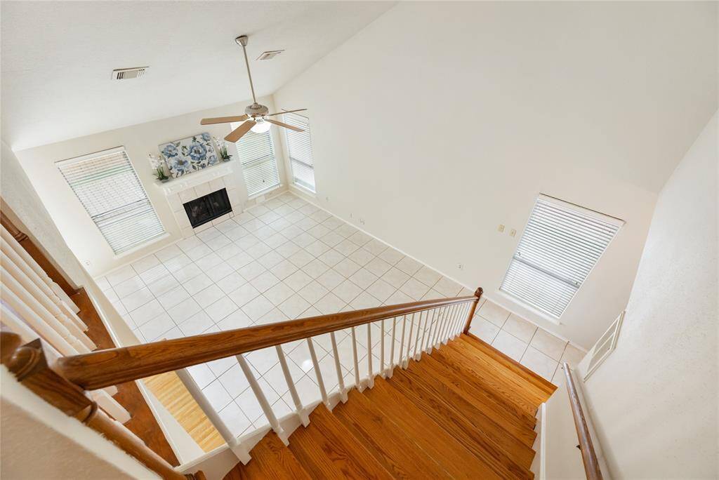 View from the top of the second story onto the living area.
