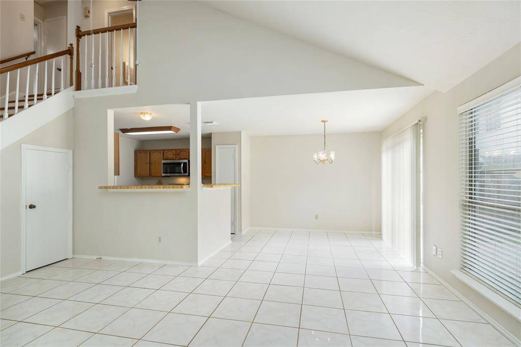 View into the kitchen and dining area from the living room.