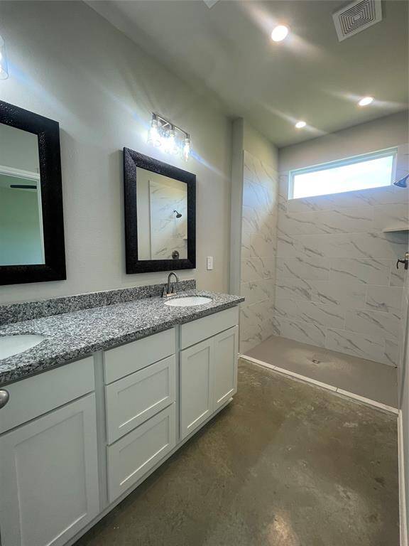 Primary Bathroom Walk-In Shower & Dual Vanity Sinks