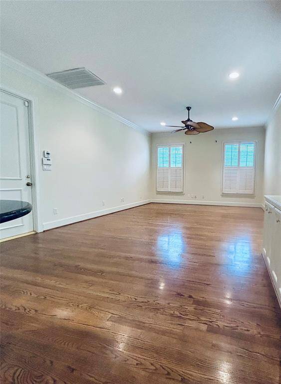 kitchen cabinet or bookshelf in this family room kitchen island area