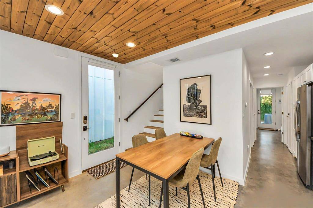 Dining area in the kitchen can accommodate a generously sized dining table or an island for additional prep space.