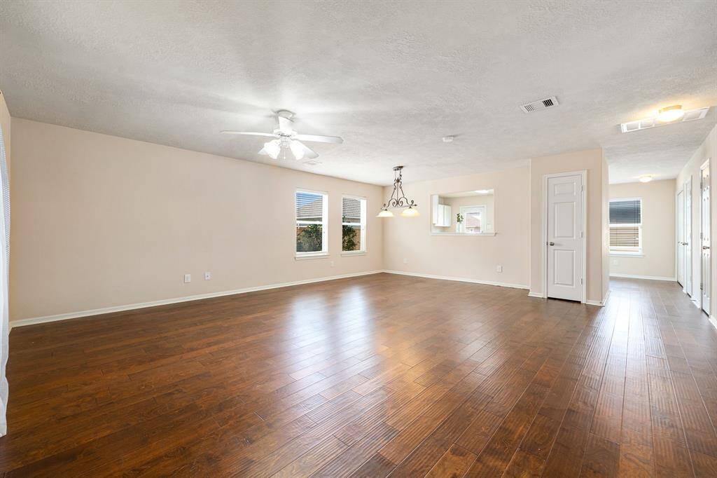 Spacious living area with a designated dining space as well
