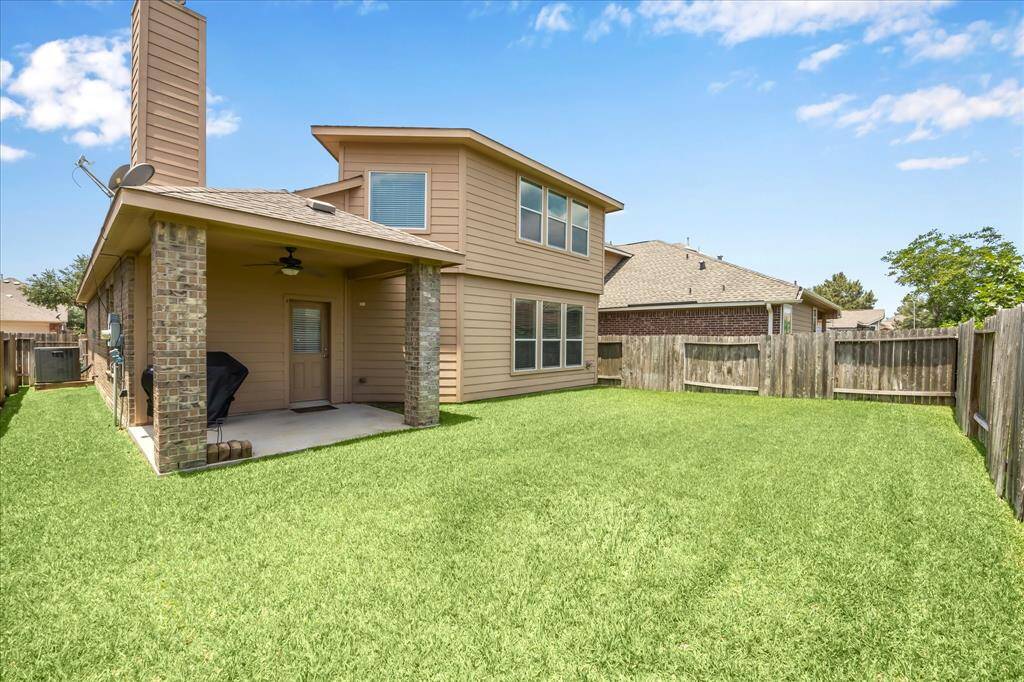 Plenty of room for all of your dreams in this large backyard.