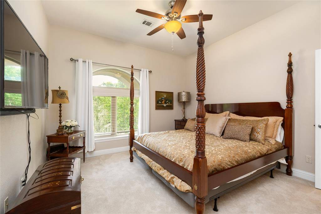 Whether it's a cozy guest suite, a welcoming space for a family member, or a peaceful retreat, this bedroom offers comfort and charm with ample space and natural light to suit any purpose.