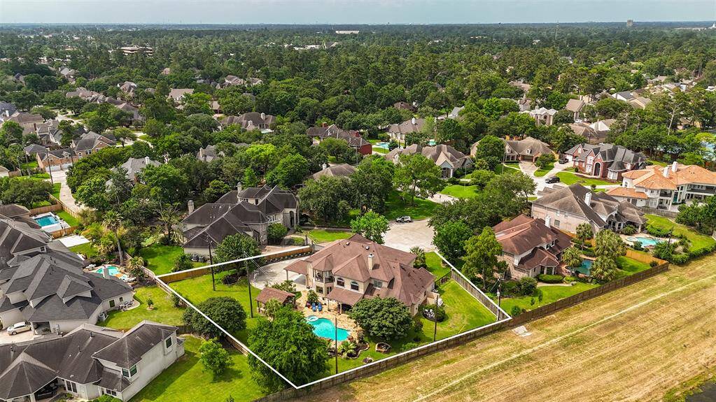 Tucked at the end of a cul-de-sac in the highly regarded Wimbledon Centre Court Estates, this home offers an unparalleled blend of luxury, seclusion, and community prestige.