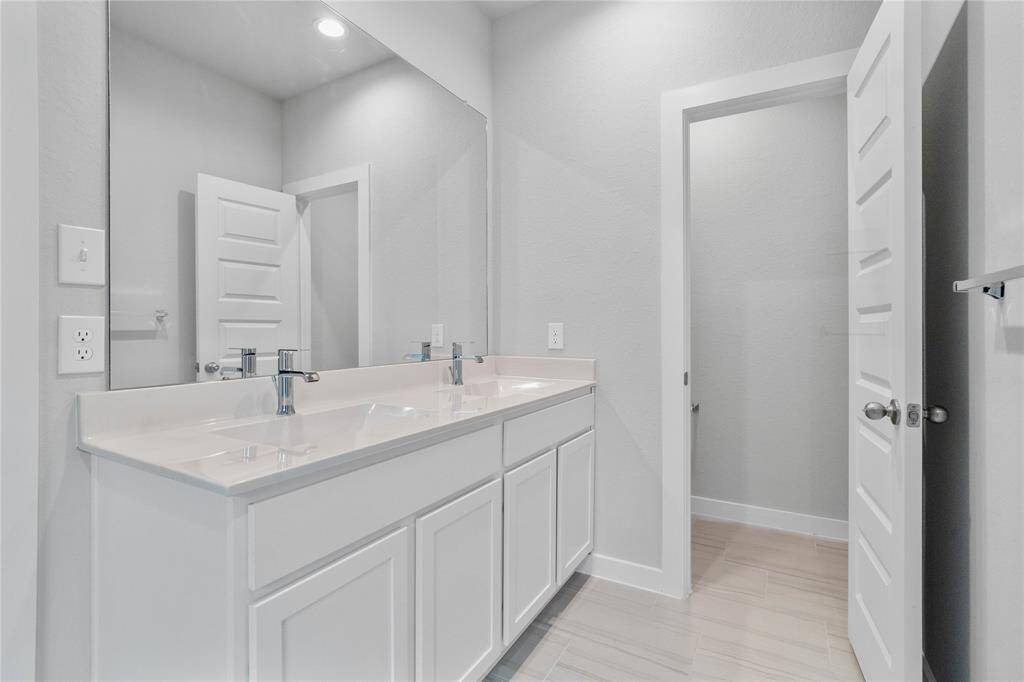 This photo is for illustrative purposes only and is not to be considered an exact replica of the finished home. Rendering does not match the finished product in terms of features, colors, landscaping, etc. Pricing, specifications, square footage and materials are subject to change at any time and without notice.