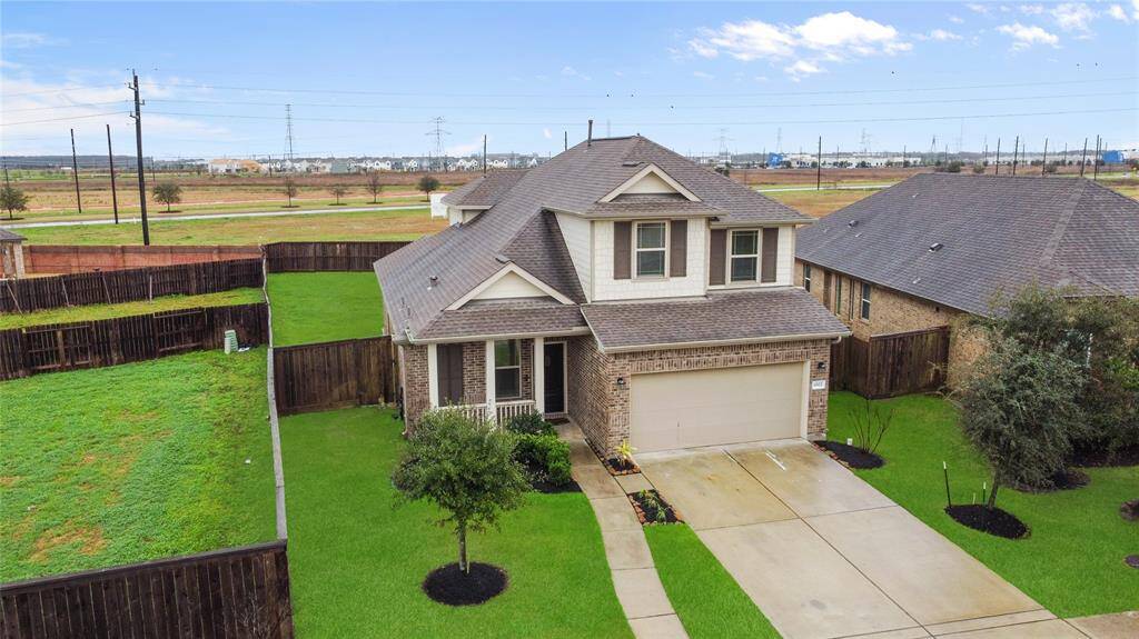 This stunning home is set on a spacious lot. The property features a well-maintained lawn with great landscaping, offering plenty of privacy.