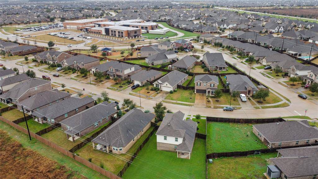 Not only is there an oversized backyard, but this photo shows the proximity to the neighborhood elementary school, within easy walking distance!