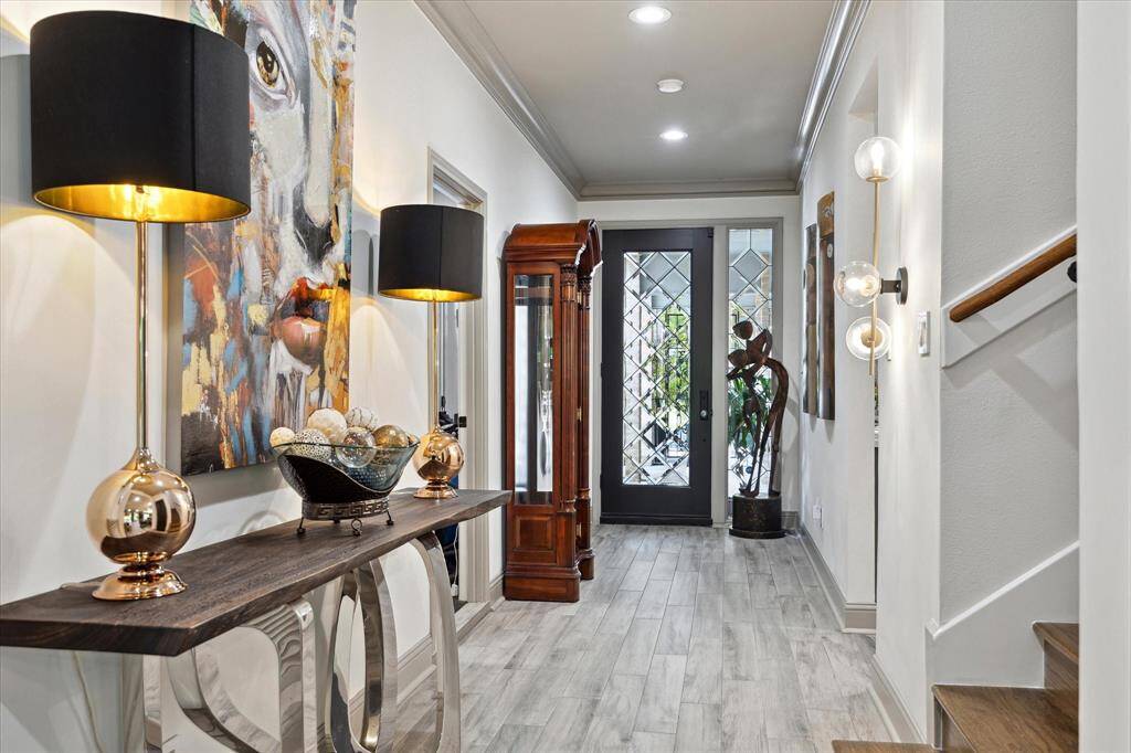 Entry hall featuring recent ceramic tile flooring
