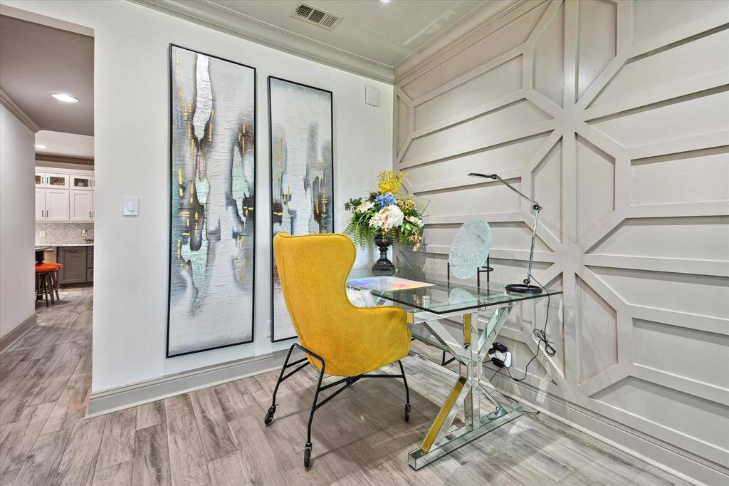 Plenty of space for a work area, piano or whatever your heart desires. Notice the detailing in this carpentry.