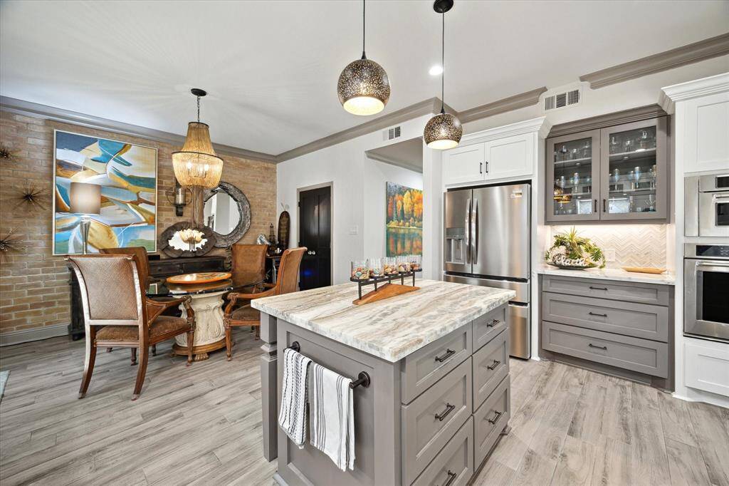 The breakfast room is located off of the kitchen as well as a huge walk-in pantry.