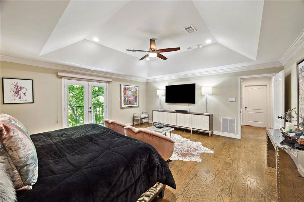 Extremely spacious primary suite with access to the balcony