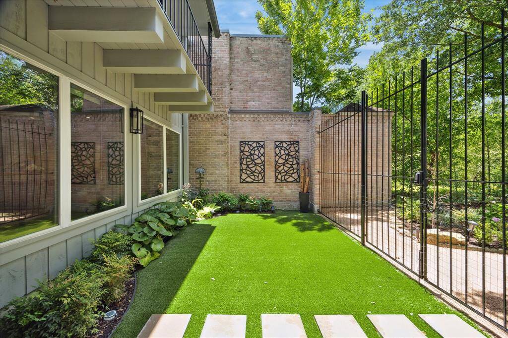 Low maintenance turf backyard.  The HOA covers the water expense for the common areas and yard.