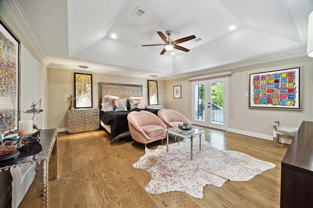 Gorgeous upstairs spacious primary suite with hardwoods and balcony