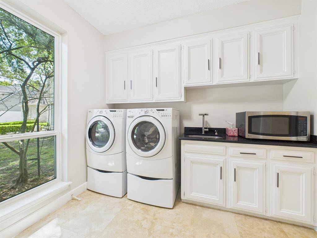 Functional Utility Room with Full Sized Units, Pedestals, Rinse Sink and Tons of Storage