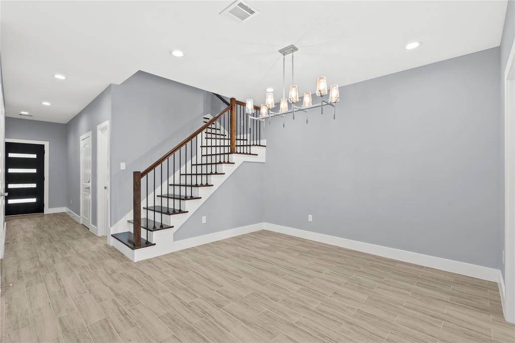 View of the nice staircase from the dining room