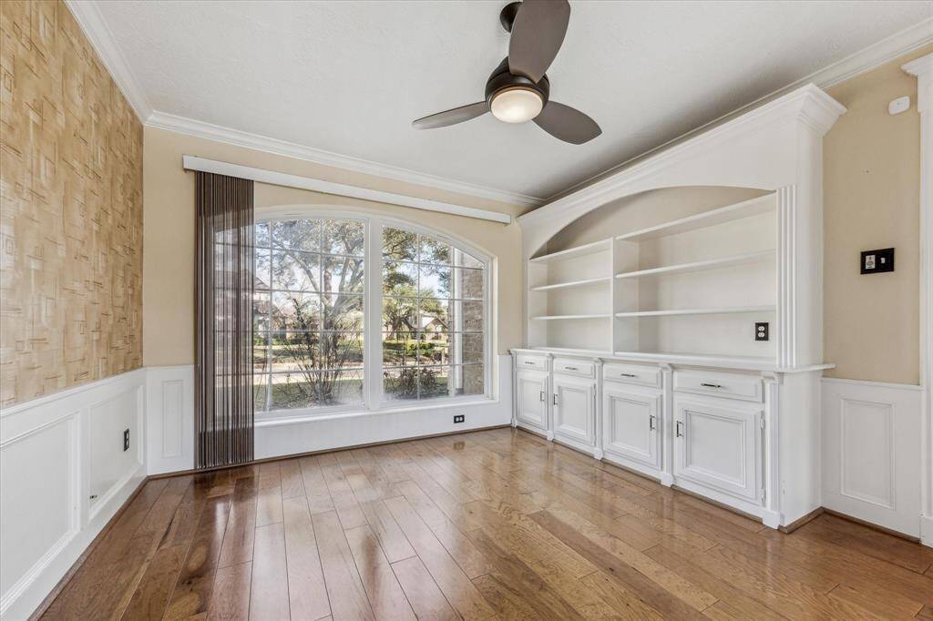 A separate, private study with street views and pool views.