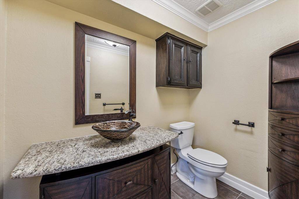 One of two half baths downstairs.