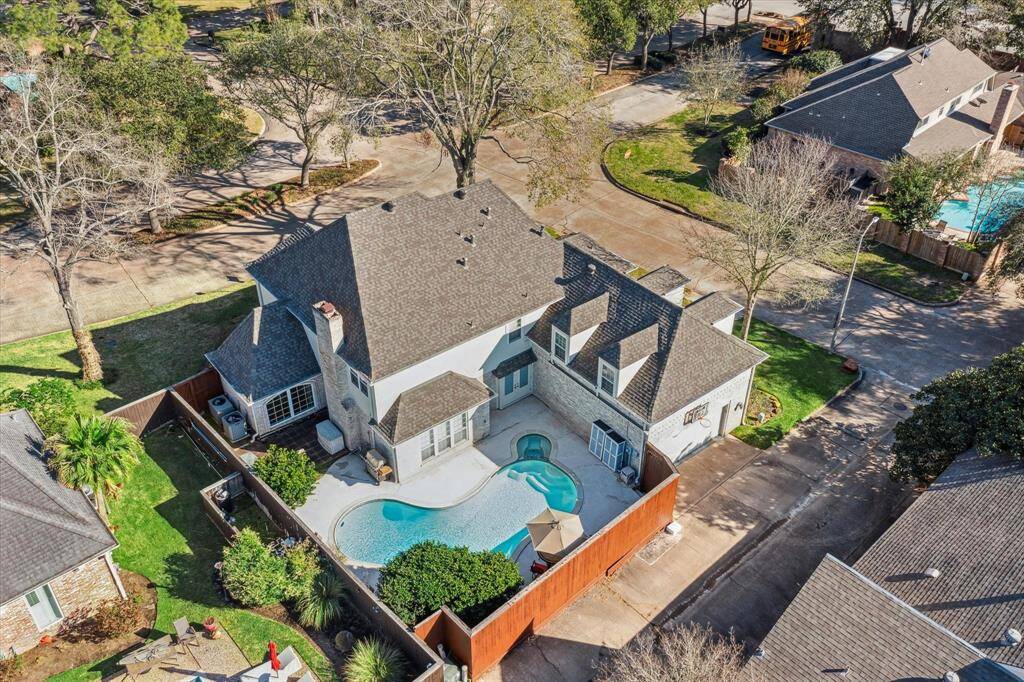 Corner lot with sparking pool and ample street parking.