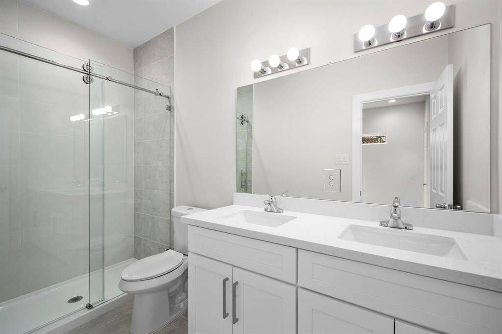 Master en-suite bathroom on 2nd floor. Double sinks and shower.