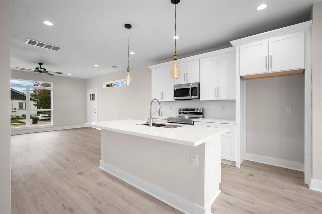 Kitchen view on 1st floor.It comes equipped with Samsung refrigerator.