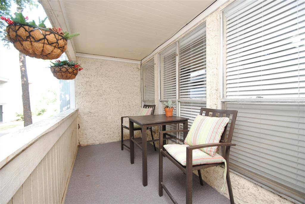 Large covered patio balcony.