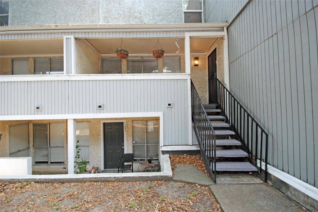 Rear balcony entry steps from walk thru gate.
