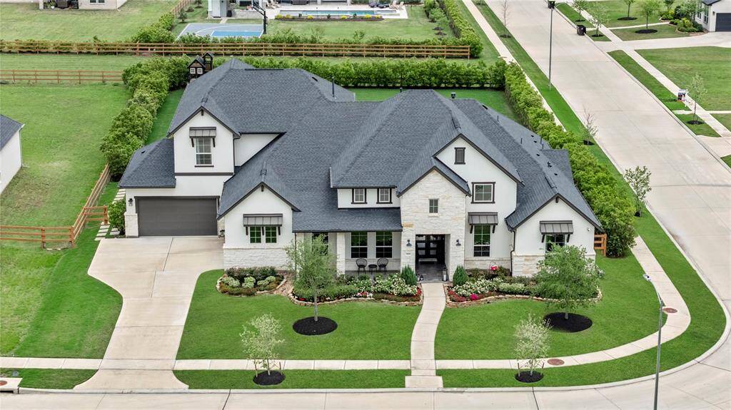 Welcome home to 7851 Longhorn Trail, nestled in the prestigious Fulshear Run community! This stunning residence offers an exceptional blend of elegance, comfort, and modern charm in one of the area's most sought-after neighborhoods.