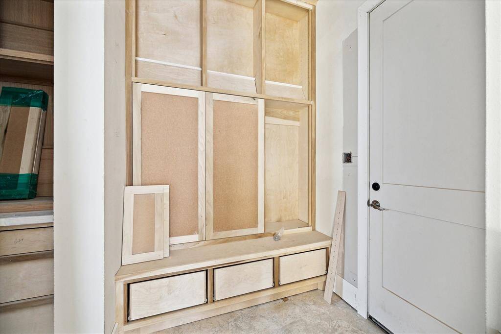 Mudroom with side entrance from the driveway.  Construction as of May 24.
