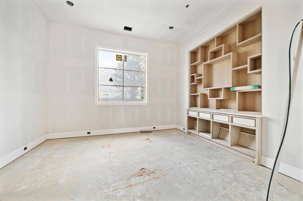 Dedicated dining room with custom cabinets.  An entertainer's dream homes.  Construction as of May 24.