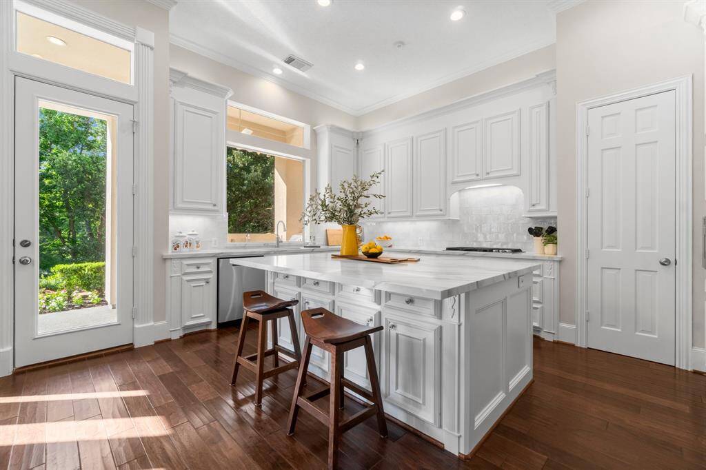 Kitchen with dine-in seating and huge island