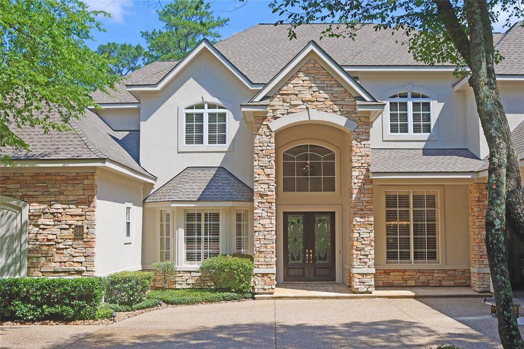 A beautifully updated Custom Home backing to the George Mitchell Nature Preserve