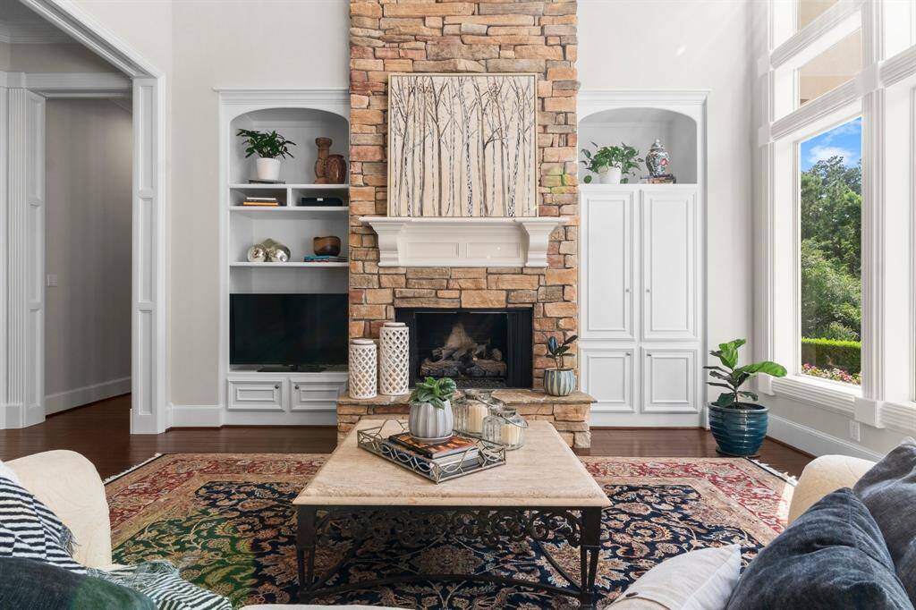 Dramatic stone gas-log fireplace