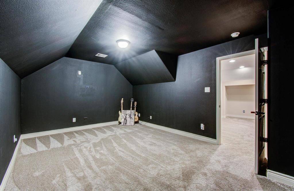 Media room can easily double as a flexible area, a retreat or even a workout room.