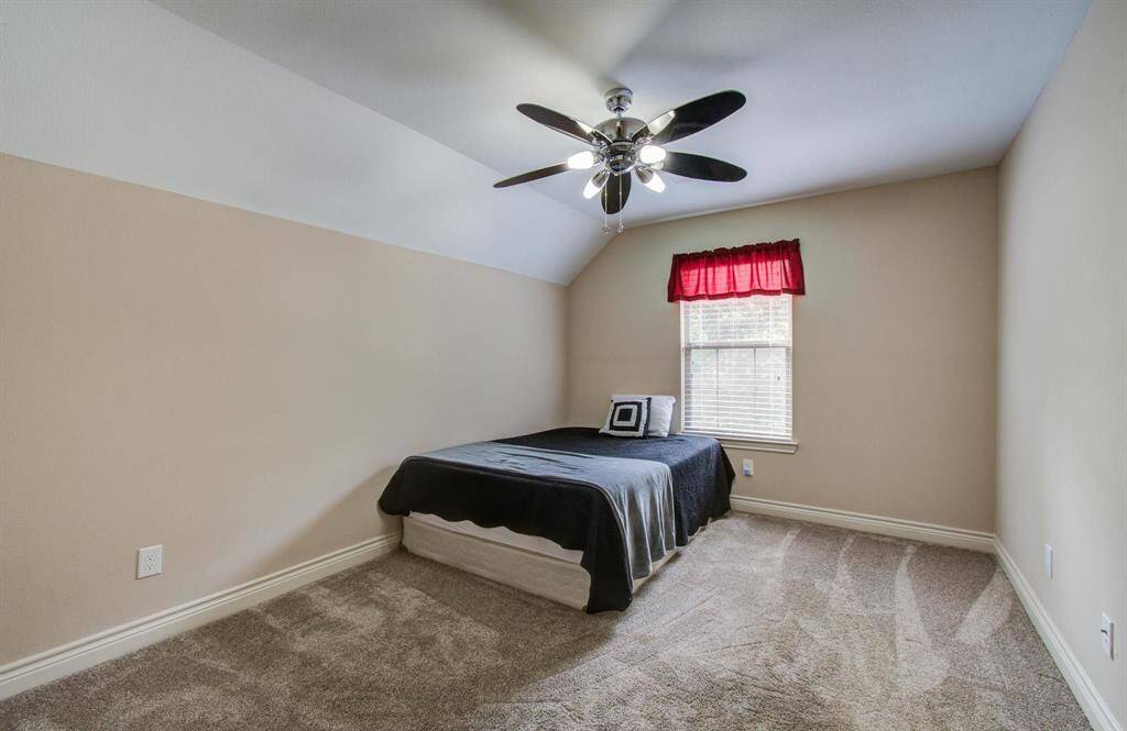 Upstairs spacious 4th bedroom, upgraded ceiling fan w/ LED lighting.