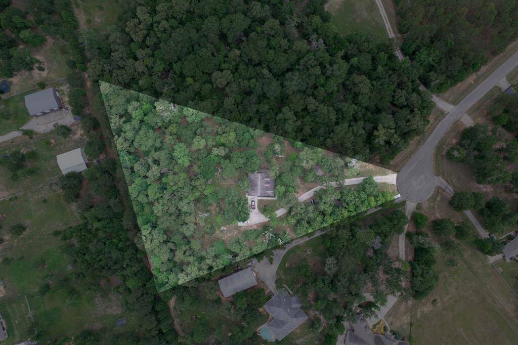 3+ ACRES accessible via a private road that ends in a cul-de-sac.