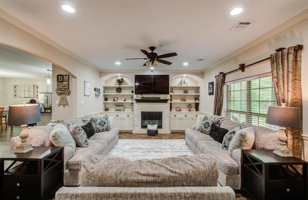 Spacious family room with subtle extended arch, serene and peaceful.